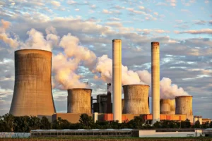 Industrial pollution with smoke-emitting factories affecting the environment and climate
